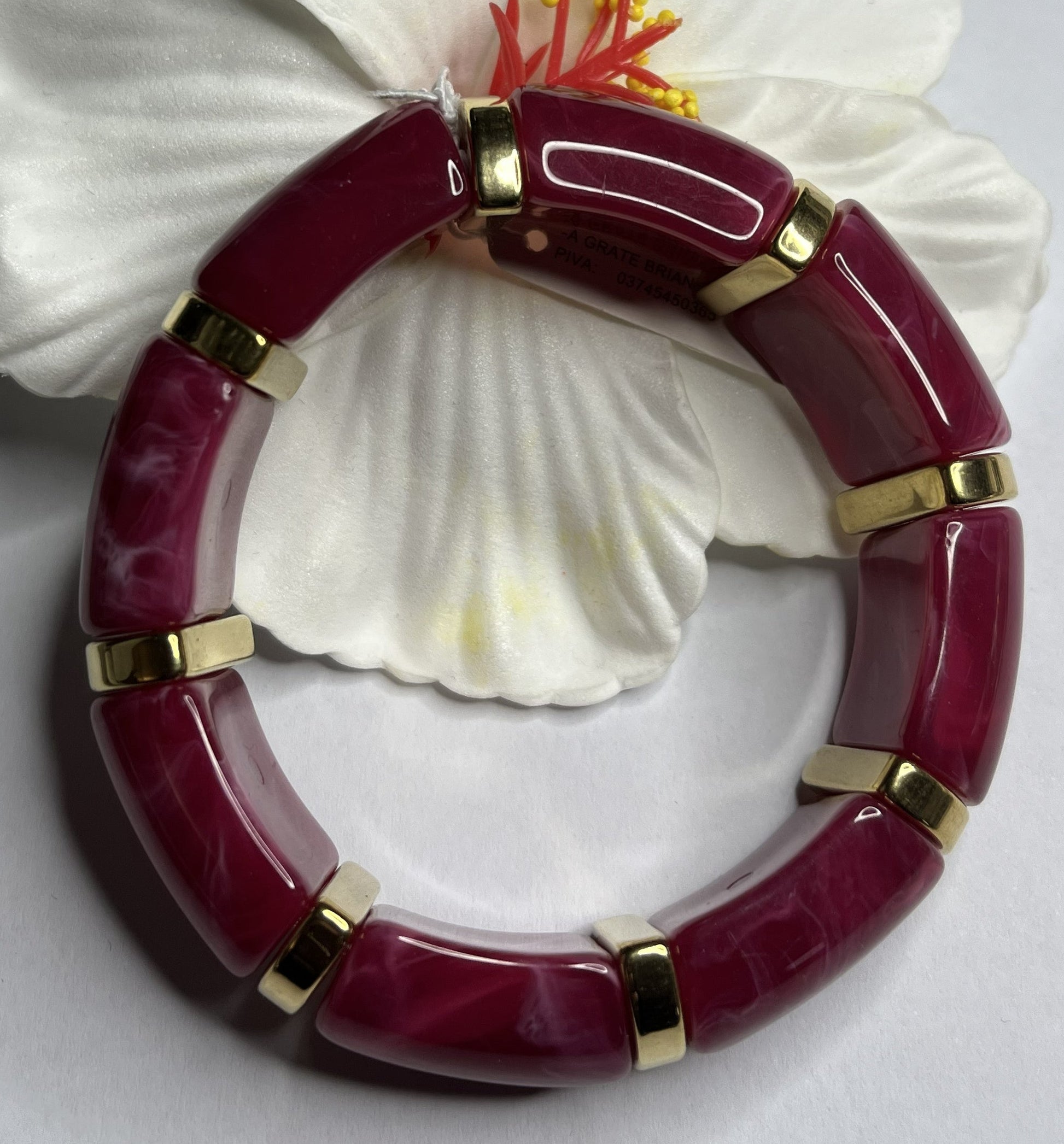 Bracciale bambù elegante con segmenti in resina bordeaux e inserti dorati
