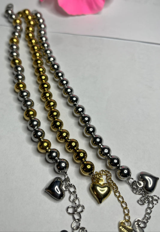 Braccialetti sfera sonagli in tre varianti - oro, argento e bicolore con sfere metalliche da 8mm e lunghezza regolabile 17+5cm