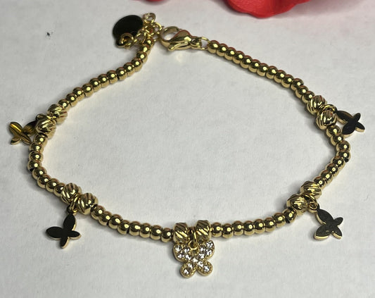 Braccialetto Papillon d'Or in acciaio premium dorato con ciondoli a forma di farfalla decorati con brillanti scintillanti, catena delicata, simbolo di trasformazione e eleganza femminile