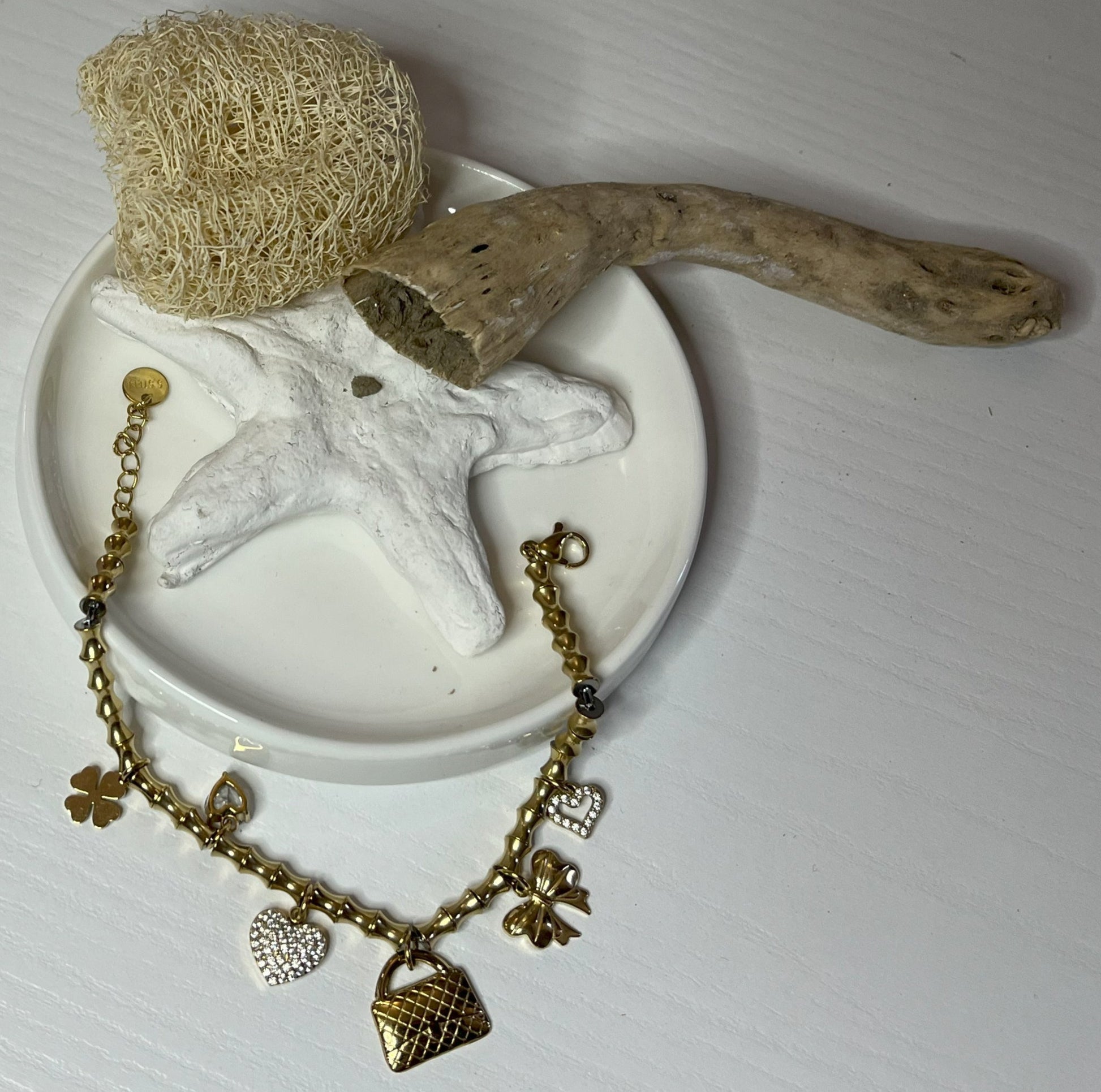 Braccialetto quadrifoglio dorato con charms
