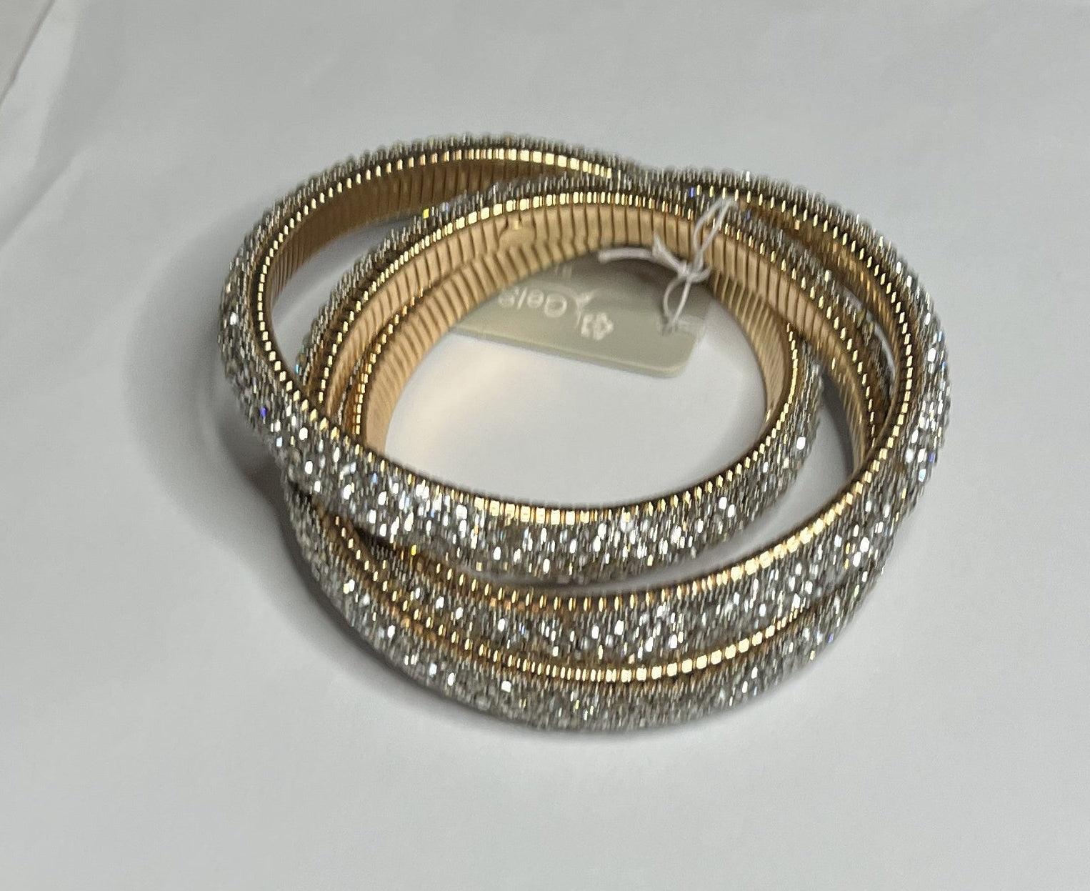Bracciale triple bangle zirconato color argento in acciaio inossidabile placcato oro con pavé cristalli e texture millegrain