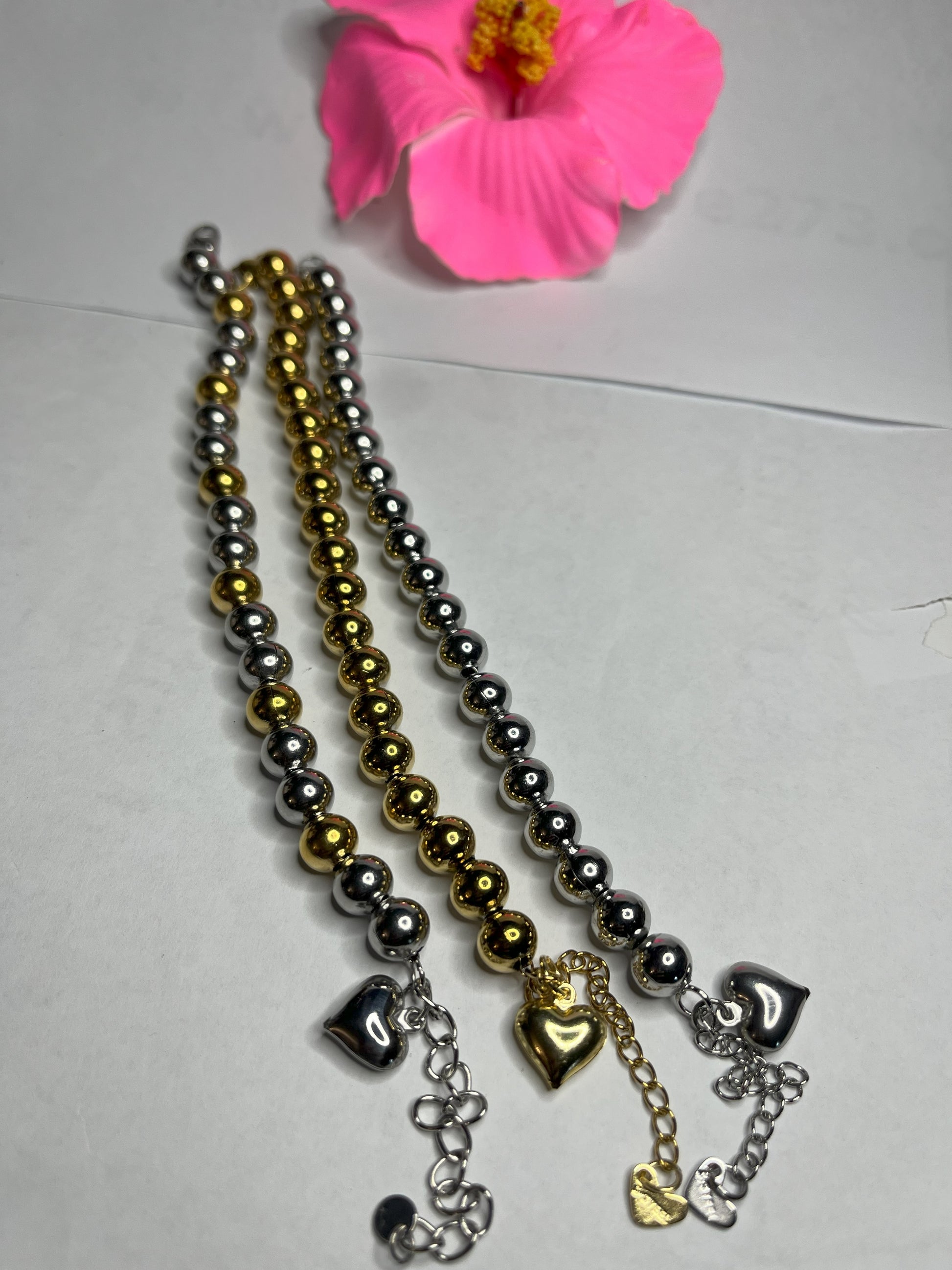 Braccialetti sfera sonagli in tre varianti - oro, argento e bicolore con sfere metalliche da 8mm e lunghezza regolabile 17+5cm