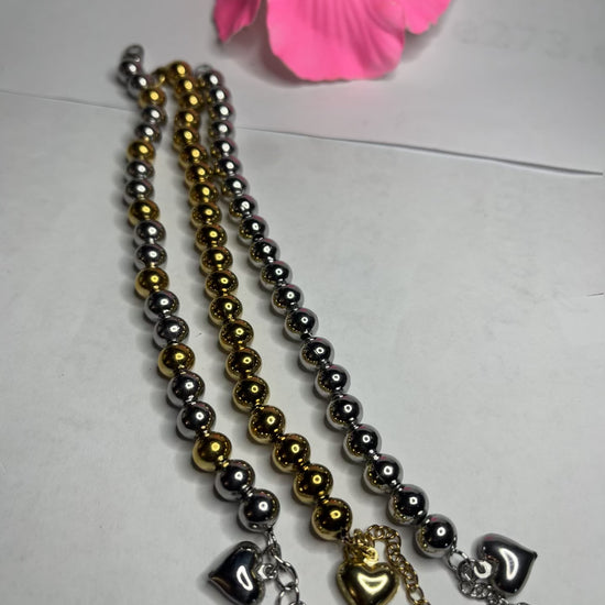 Braccialetti sfera sonagli in tre varianti - oro, argento e bicolore con sfere metalliche da 8mm e lunghezza regolabile 17+5cm